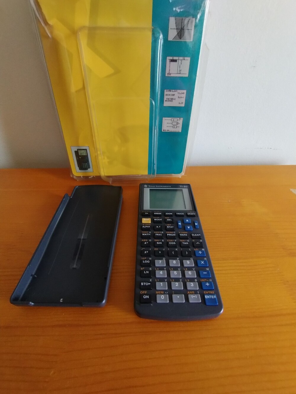 Texas Instruments Calculator in Blue and Black with Gray Keys